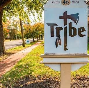 The street front signage for Tribe Intensive alcohol outpatient treatment center in Marlton, NJ